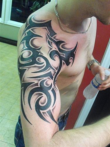 tattooing Phoenix design